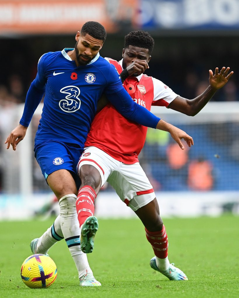 Partey tackles a Chelsea player
