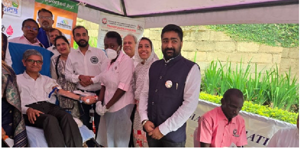 The Indian High Commissioner to Uganda, Mr Sing Rawat donating blood in Kampala on Thursday.