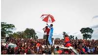 Ugandan musician turned politician Robert Kyagulanyi (C), also known as Bobi Wine