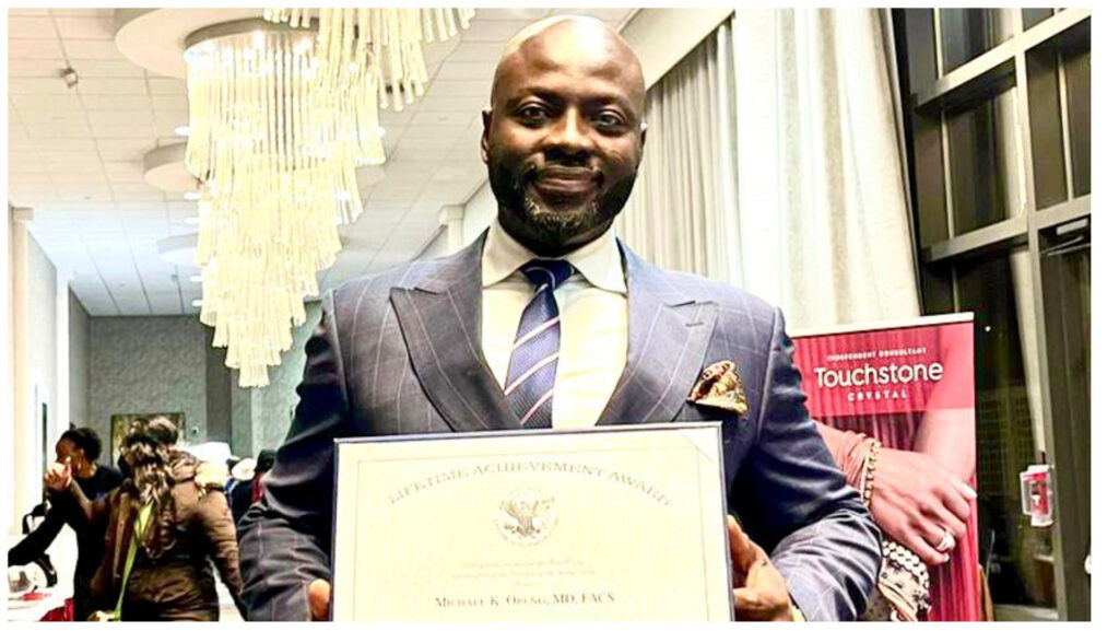 Dr. Michael K. Obeng with his letter signed by US president Joe Biden