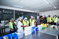 The trade minister (next to lady in white) and some key stakeholders during the tour