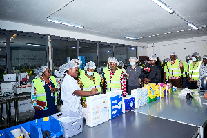 The trade minister (next to lady in white) and some key stakeholders during the tour