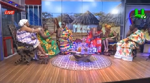 A wide shot of host MzGee (far left) with her guests