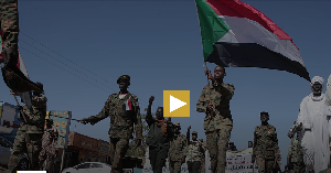 Sudanese army soldiers parade in the streets of Omdurman, a district of Khartoum, Sudan