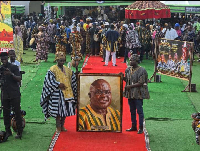 Dr Julius Debrah been presented with the frame