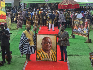 Dr Julius Debrah been presented with the frame