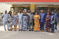 The Parliamentary Select Committee with Dzifa Gomashie during their visit