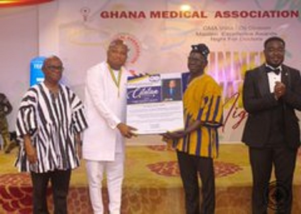 Samuel Okudzeto Ablakwa receiving the award from the GMA