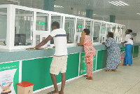 Some customers at a Rural and Community Banks (RCBs) in Ghana
