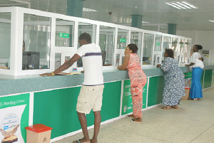 Some customers at a Rural and Community Banks (RCBs) in Ghana