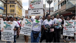 Crowds of anti-illegal immigration protesters demonstrate in the streets in Durban, South Africa