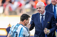Lionel Messi (left) with Gianni Infantino