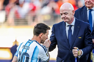 Lionel Messi (left) with Gianni Infantino