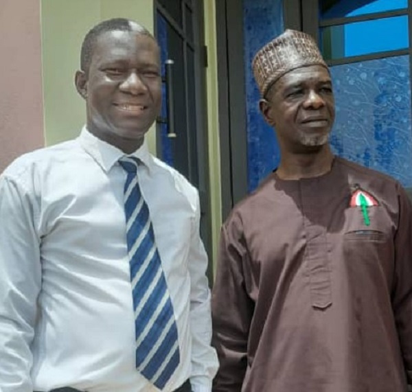 Dr. Maalug with the Bono East Region Chairman, Unas Owusu, at the vetting grounds