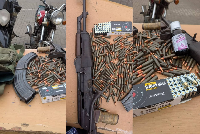 An exhibit of the AK-47 rifle and 186 rounds of ammunition seized after the encounter