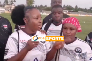 A photo of the supporters threatening the naked protest