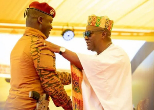 Captain Ibrahim Traoré (L) with John Dramani Mahama at the inauguration