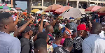 Bawumia mobbed in Ho market as traders scramble for his 'It Is Possible' T-shirts