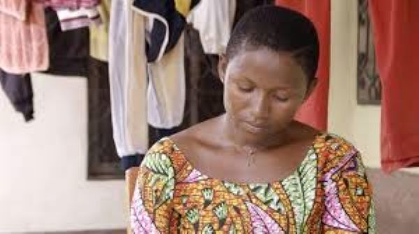 Ngabi Dora Tue still feels the pain four years after her husband's brutal killing
