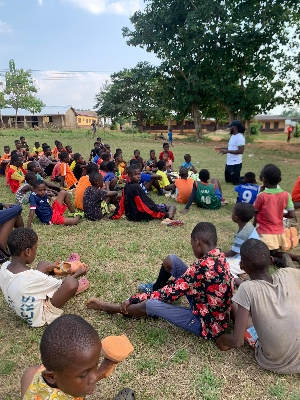 Coach Ofori interacting with some young footballers during his tour