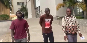 Abdulai Kadiri, Convict (middle) leaving the premises of the Law Court Complex in Accra