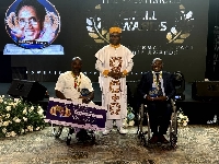 Bishop Dr. Charles Cofie Hackman with 2 of the award winners