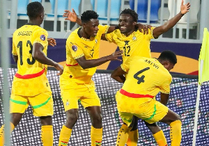 Antwi (R) celebrating with his teammates