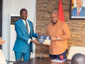 Richard Adjei Mensah Ofori Atta (L) and President John Mahama (R)
