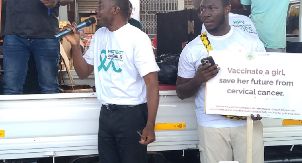 Members of Curious Minds seen educating the public