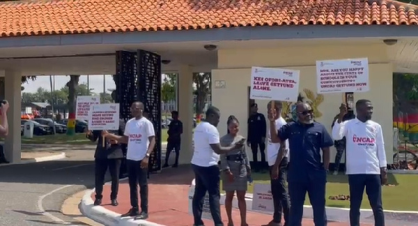 Members of NUGS, including NUGS President Dennis Appiah Larbi-Ampofo spotted wearing white shirts