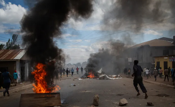 People protest in the streets of Arusha, Tanzania, on election day, on Wednesday, October 29, 2025