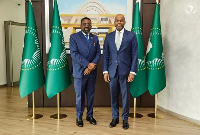 AfCFTA Secretary-General Wamkele Mene (R) and BoG Governor, Dr Asiama (L)