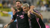 Lionel Messi and Luis Suarez celebrating a goal