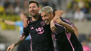 Lionel Messi and Luis Suarez celebrating a goal