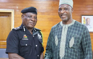 Mohammed-Mubarak Muntaka and IGP Christian Tetteh Yohuno