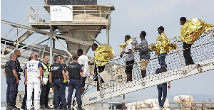 The migrants disembarked at the Port de Commerce in Boulogne-sur-Mer, France, following the rescue