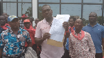 Aggrieved customers of Legacy Fund Management stage picketing in Accra
