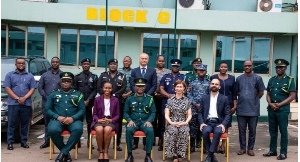 Comptroller-Gen of Immigration Samuel Basintale (seated middle) with dignitaries after the launch
