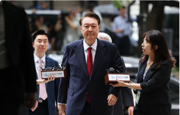 Yoon Suk Yeol arrives at a court in Seoul for a hearing to review his arrest warrant in July