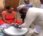 Watch as Mike Oquaye Jnr washes clothes of some Dome-Kwabenya constituents