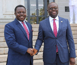 Reverend John Ntim Fordjour (left) and the late Minister for Defence, Dr Edward Omane Boamah