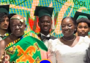 Asantehene (L) Lady Julia Osei Tutu (R) pose with son, graduates for a photo after the ceremony