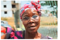 A photo of the mother of one of the suspects