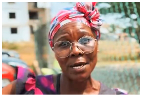 A photo of the mother of one of the suspects