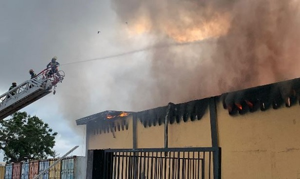 Firefighters battling the blaze at the Dignity DTRT clothing and textile facility