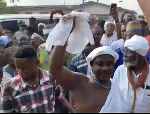 A screenshot from the video of the arrival of the chief priest after his release