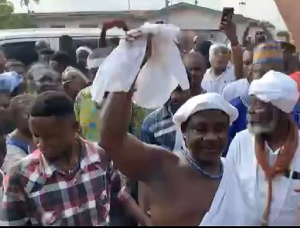 A screenshot from the video of the arrival of the chief priest after his release