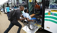 Commuters board buses in Kigali on August 30, 2019