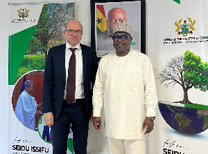 Seidu Issifu (R) flanked to the left by Jürgen Heissel during their meeting