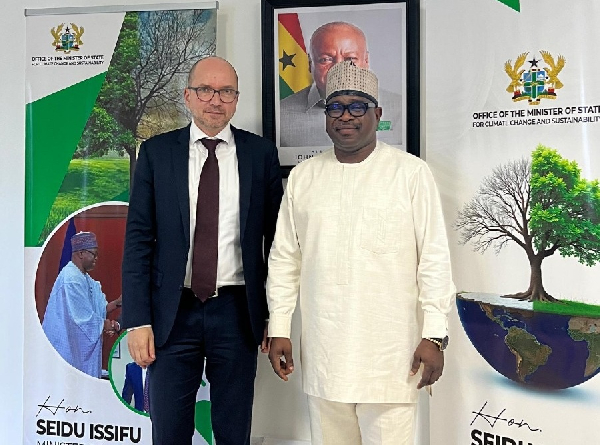 Seidu Issifu (R) flanked to the left by Jürgen Heissel during their meeting
